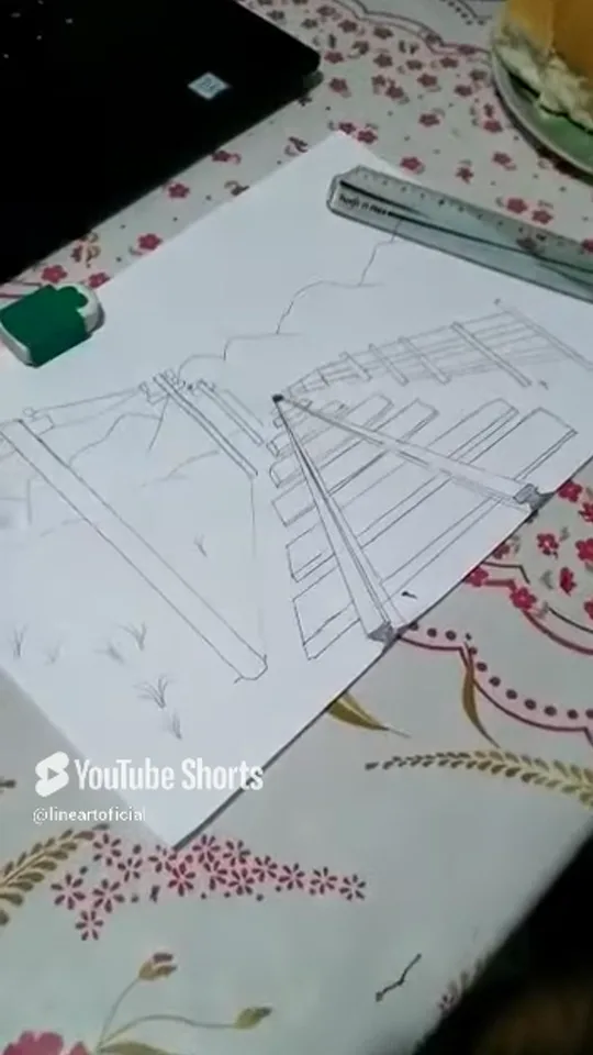 Aluno Samuel, 8 anos, desenhando em casa durante o encontro ao vivo, filmado pela mãe